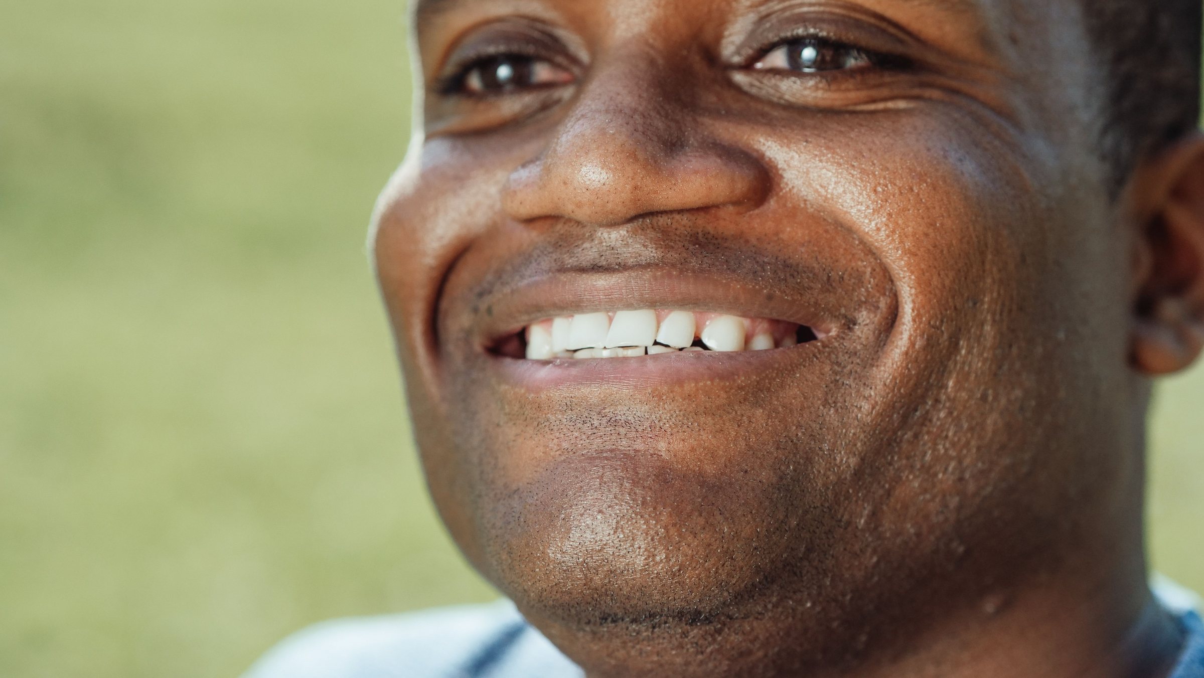 A confident professional smiling warmly
